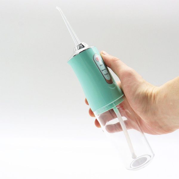 Портативний іригатор для порожнини рота 230 мл, Portable Oral Irrigator, Блакитний / Електричний іригатор для зубів з насадкой 234563499 фото