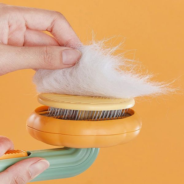 Щітка для вичісування шерсті котів та собак, Pet Tails Brush W26 / Гребінець для тварин з кнопкою 234573195 фото