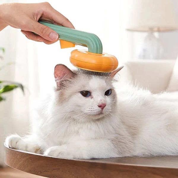 Щітка для вичісування шерсті котів та собак, Pet Tails Brush W26 / Гребінець для тварин з кнопкою 234573195 фото