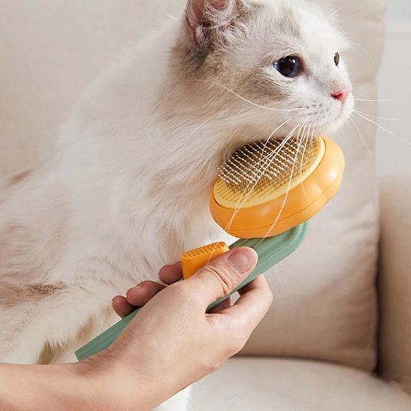 Щітка для вичісування шерсті котів та собак, Pet Tails Brush W26 / Гребінець для тварин з кнопкою 234573195 фото